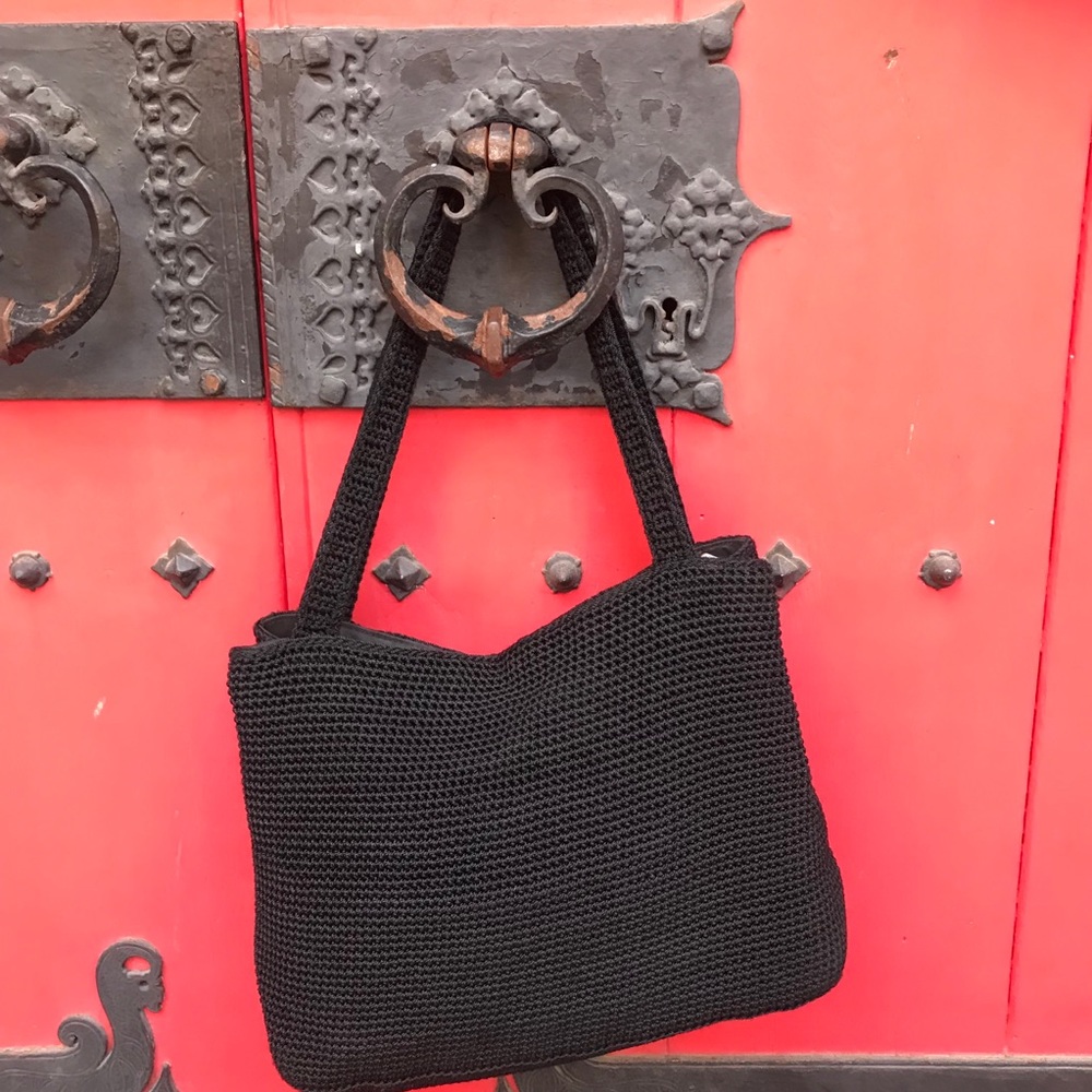 The Sak cross-knitted two pocket black bag